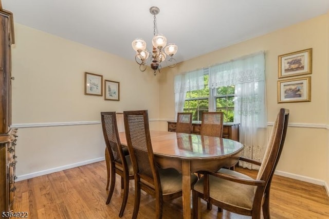 263 Bellemead Griggstown Rd, Montgomery Twp, NJ 08502 - dining area with a chandelier and light wood finished floors