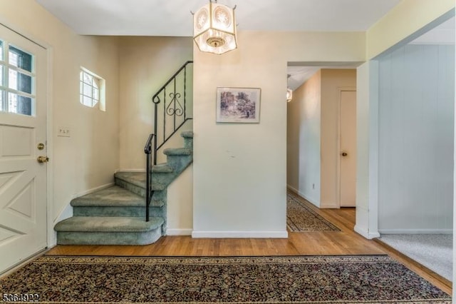 263 Bellemead Griggstown Rd, Montgomery Twp, NJ 08502 - foyer entrance with wood finished floors, stairway, and a chandelier