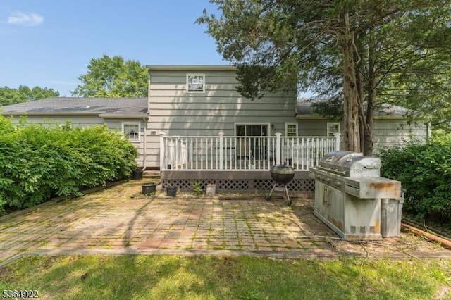 263 Bellemead Griggstown Rd, Montgomery Twp, NJ 08502 - back of house with a deck, a patio, and roof with shingles