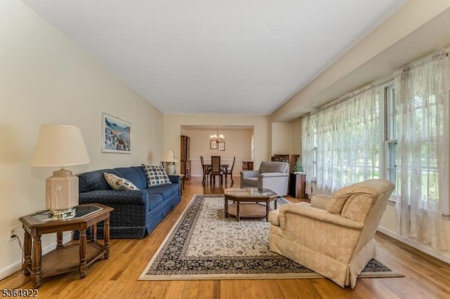 263 Bellemead Griggstown Rd, Montgomery Twp, NJ 08502 - living area featuring a chandelier and wood finished floors
