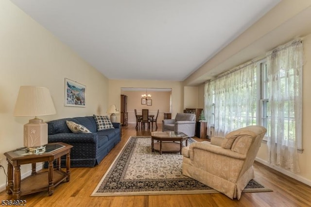 263 Bellemead Griggstown Rd, Montgomery Twp, NJ 08502 - living area with a chandelier and wood finished floors