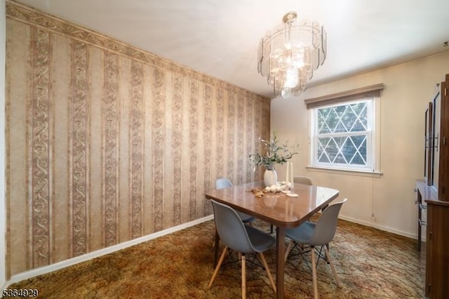 317 Stevens Ave, Jersey City, NJ 07305 - dining area featuring a chandelier and carpet floors