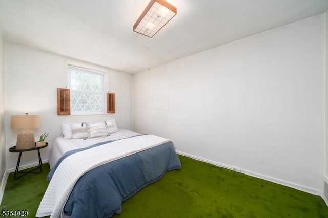 317 Stevens Ave, Jersey City, NJ 07305 - carpeted bedroom with baseboards