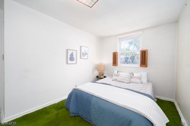 317 Stevens Ave, Jersey City, NJ 07305 - carpeted bedroom featuring baseboards