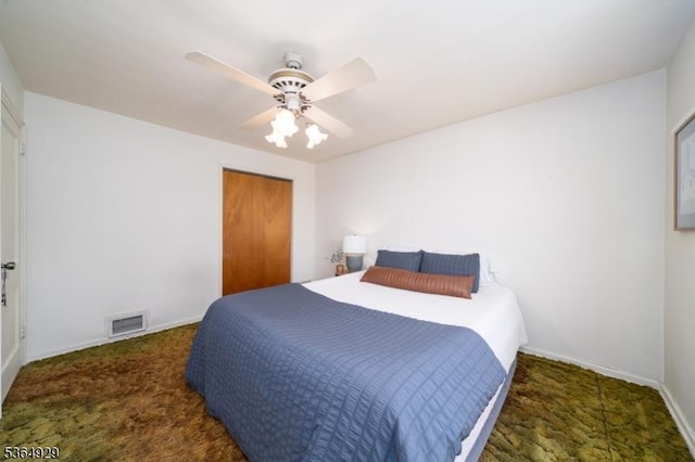 317 Stevens Ave, Jersey City, NJ 07305 - carpeted bedroom with a closet and a ceiling fan