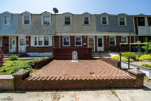 317 Stevens Ave, Jersey City, NJ 07305 - view of property with brick siding and cooling unit