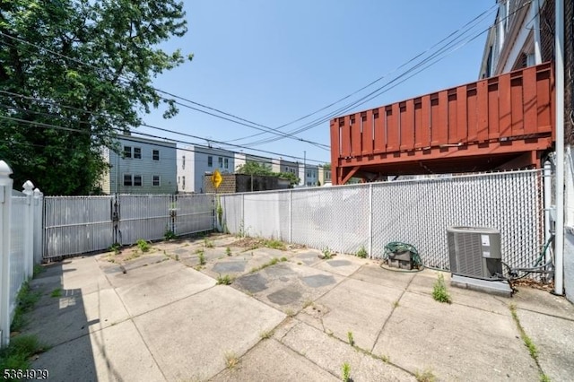 317 Stevens Ave, Jersey City, NJ 07305 - fenced backyard with a patio area