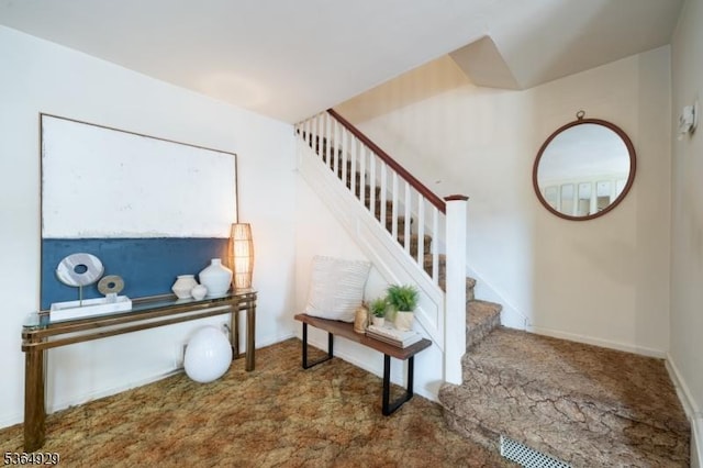 317 Stevens Ave, Jersey City, NJ 07305 - staircase with carpet floors