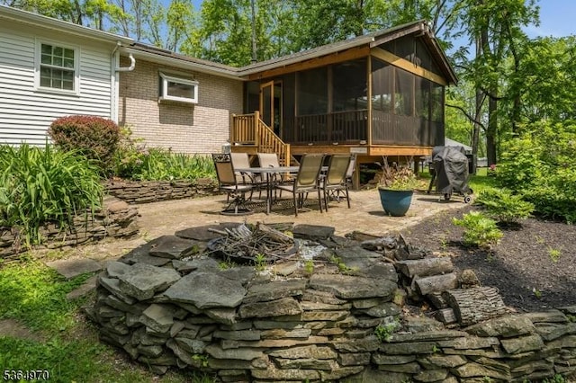 25 Old Turnpike Rd, Washington Twp, NJ 07865 - view of patio featuring a sunroom, area for grilling, and outdoor dining space