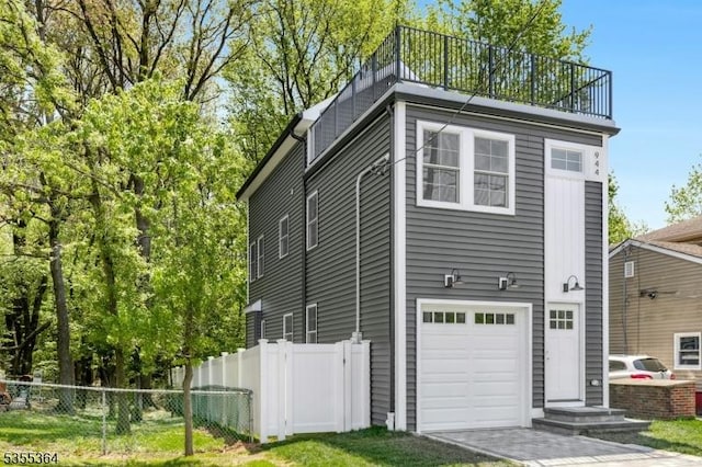 944 Orange Ave, Cranford Twp, NJ 07016 - view of home's exterior featuring a balcony and an attached garage