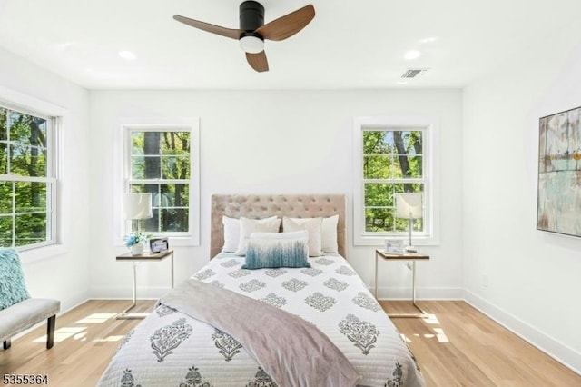 944 Orange Ave, Cranford Twp, NJ 07016 - bedroom featuring multiple windows, light wood-style floors, and a ceiling fan