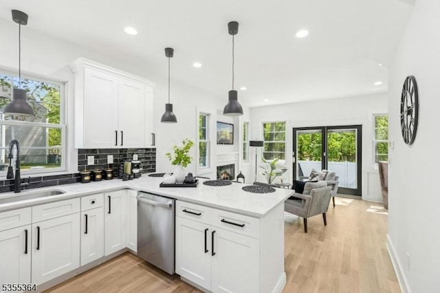 944 Orange Ave, Cranford Twp, NJ 07016 - kitchen featuring dishwasher, backsplash, a peninsula, recessed lighting, and white cabinetry