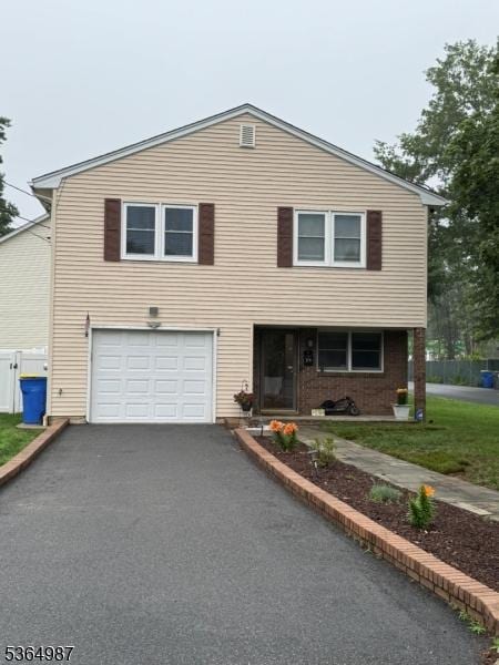 14 Lenox Ave, Green Brook Twp, NJ 08812 - view of front of property featuring an attached garage and asphalt driveway