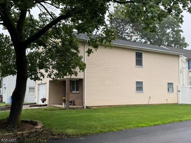 14 Lenox Ave, Green Brook Twp, NJ 08812 - view of property exterior with a yard