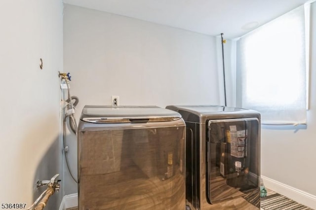 14 Lenox Ave, Green Brook Twp, NJ 08812 - washroom with washing machine and clothes dryer and baseboards