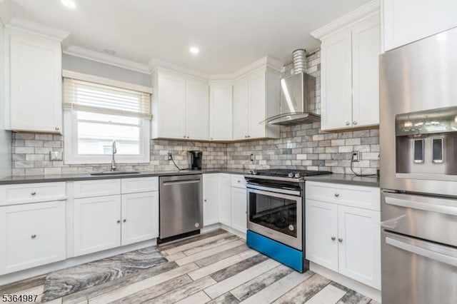 14 Lenox Ave, Green Brook Twp, NJ 08812 - kitchen featuring appliances with stainless steel finishes, wall chimney range hood, dark countertops, ornamental molding, and white cabinets