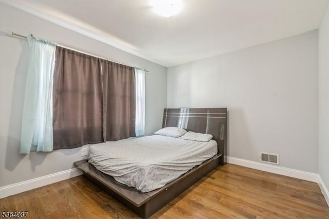 14 Lenox Ave, Green Brook Twp, NJ 08812 - bedroom featuring baseboards and wood finished floors