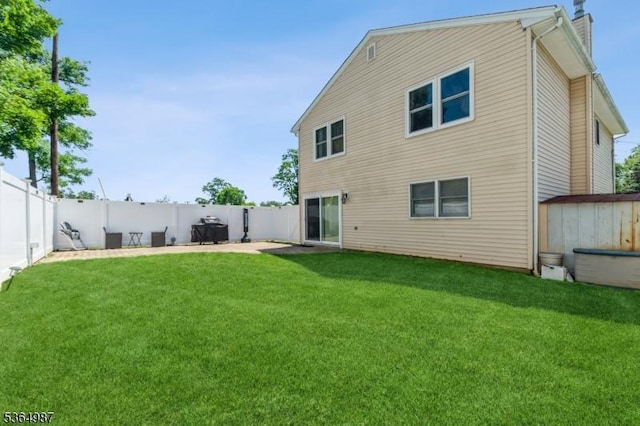 14 Lenox Ave, Green Brook Twp, NJ 08812 - rear view of house featuring a fenced backyard, a storage shed, a patio area, and a chimney