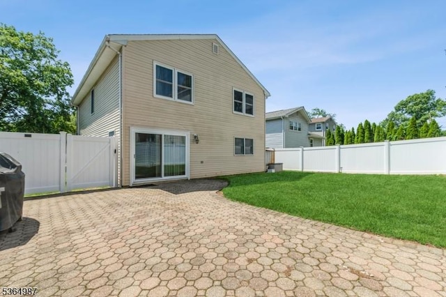 14 Lenox Ave, Green Brook Twp, NJ 08812 - rear view of house with a gate, a fenced backyard, and a patio area