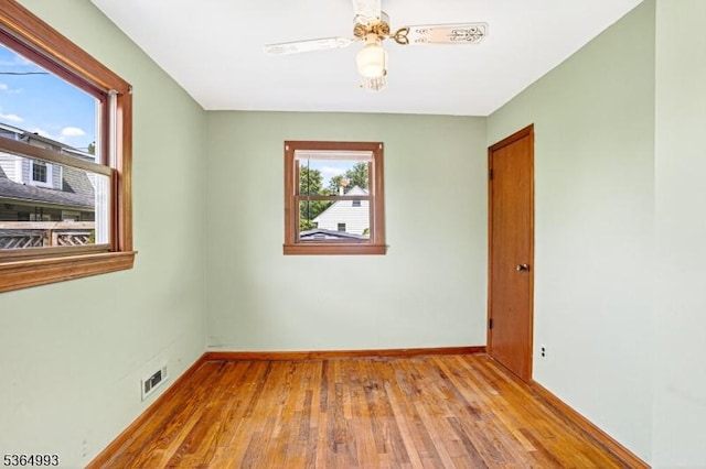 1033 Huff Ave, Manville Boro, NJ 08835 - empty room with hardwood / wood-style flooring and a ceiling fan