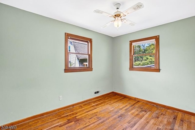1033 Huff Ave, Manville Boro, NJ 08835 - spare room with ceiling fan and wood finished floors