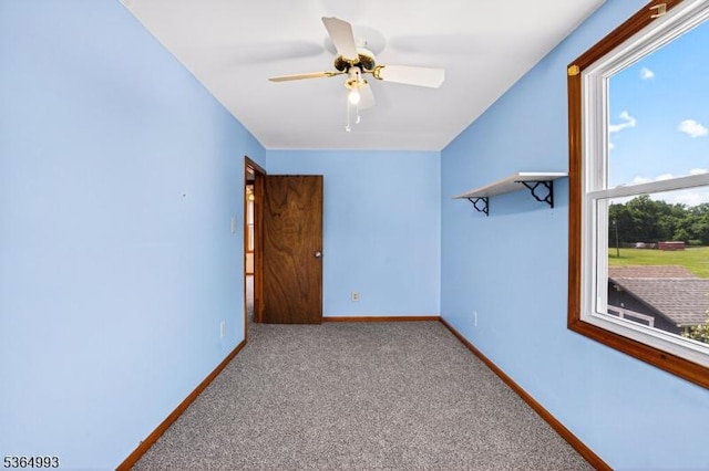 1033 Huff Ave, Manville Boro, NJ 08835 - carpeted empty room with baseboards and ceiling fan