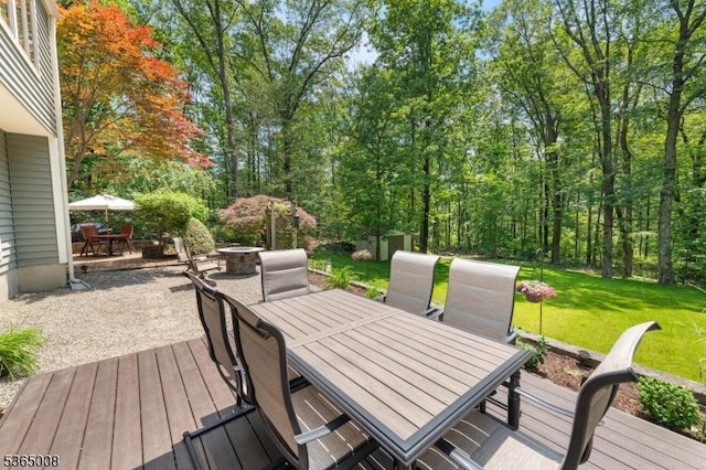 16 Forest Dr, Hampton Twp, NJ 07860 - wooden terrace featuring outdoor dining space, a shed, a patio, a yard, and a fire pit