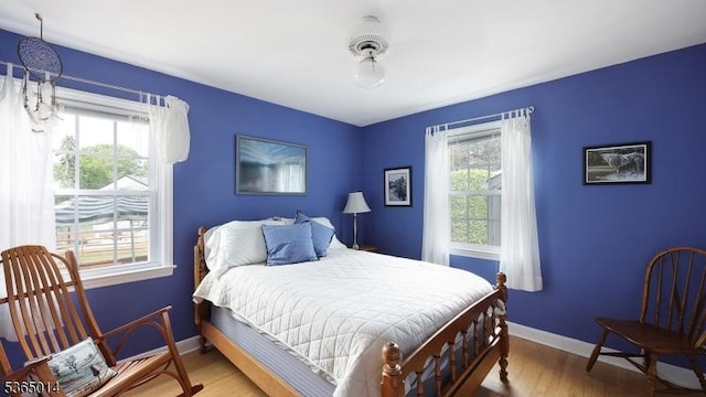 120 Meadowbrook Dr, North Plainfield Boro, NJ 07062 - bedroom featuring multiple windows and wood finished floors