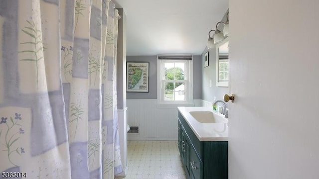 120 Meadowbrook Dr, North Plainfield Boro, NJ 07062 - bathroom with a wainscoted wall, vanity, and tile patterned floors