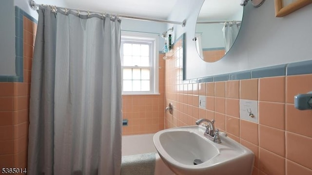 120 Meadowbrook Dr, North Plainfield Boro, NJ 07062 - bathroom with tile walls and shower / tub combo with curtain