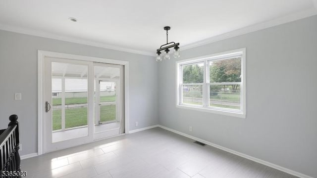 122 Madison St, South Bound Brook Boro, NJ 08880 - unfurnished dining area with ornamental molding and a chandelier