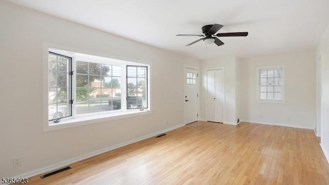 122 Madison St, South Bound Brook Boro, NJ 08880 - foyer with light wood-style flooring and ceiling fan