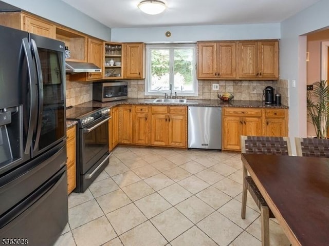 16 Seneca Trl, Randolph Twp, NJ 07869 - kitchen with stainless steel appliances, under cabinet range hood, backsplash, dark stone counters, and open shelves