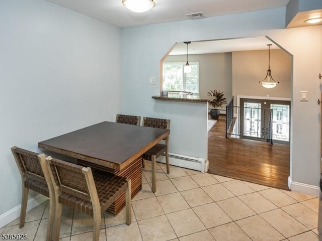 16 Seneca Trl, Randolph Twp, NJ 07869 - dining space featuring a baseboard heating unit and light tile patterned floors