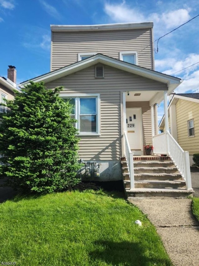 229 2nd Ave, Garwood Boro, NJ 07027 - view of front of property featuring a front yard and entry steps