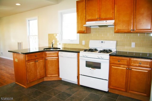 229 2nd Ave, Garwood Boro, NJ 07027 - kitchen with white appliances, under cabinet range hood, healthy amount of natural light, a peninsula, and recessed lighting
