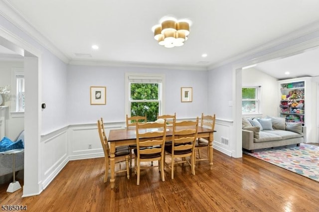 849 Bradford Ave, Westfield Town, NJ 07090 - dining room with wood finished floors, ornamental molding, a wainscoted wall, and a decorative wall