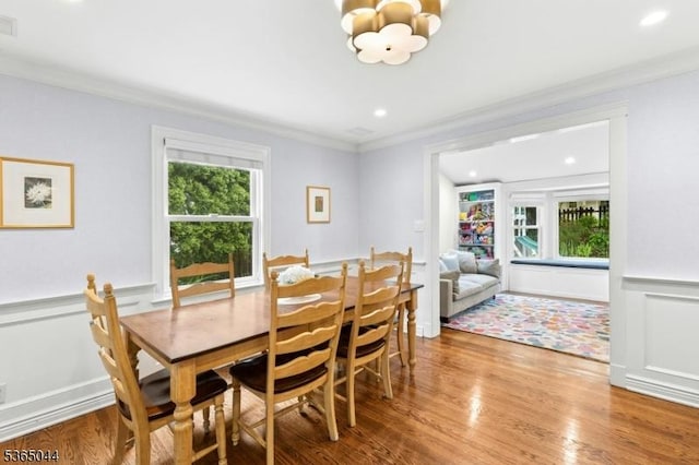 849 Bradford Ave, Westfield Town, NJ 07090 - dining area featuring crown molding, a chandelier, wood finished floors, wainscoting, and recessed lighting