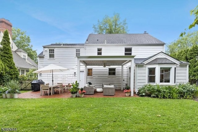 849 Bradford Ave, Westfield Town, NJ 07090 - back of property featuring a patio area, a lawn, and a ceiling fan