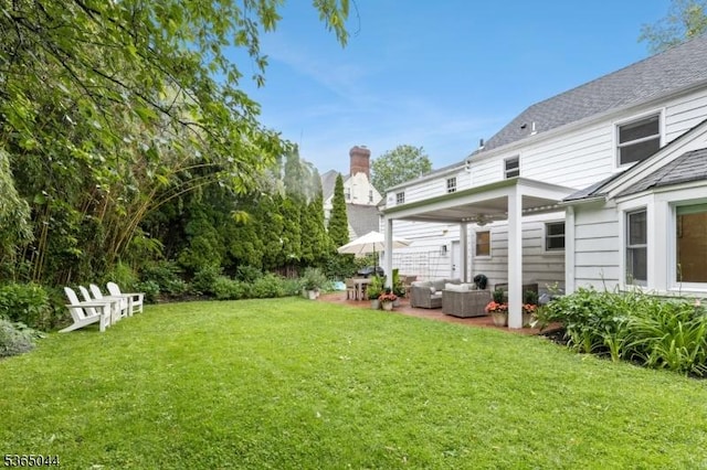 849 Bradford Ave, Westfield Town, NJ 07090 - view of green lawn featuring outdoor lounge area and a patio
