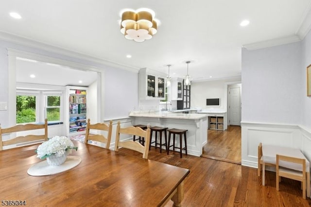 849 Bradford Ave, Westfield Town, NJ 07090 - dining area with crown molding, wood finished floors, a wainscoted wall, and recessed lighting