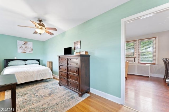 268 Warburton Ave, Hawthorne Boro, NJ 07506 - bedroom with light wood-style flooring, radiator, and ceiling fan