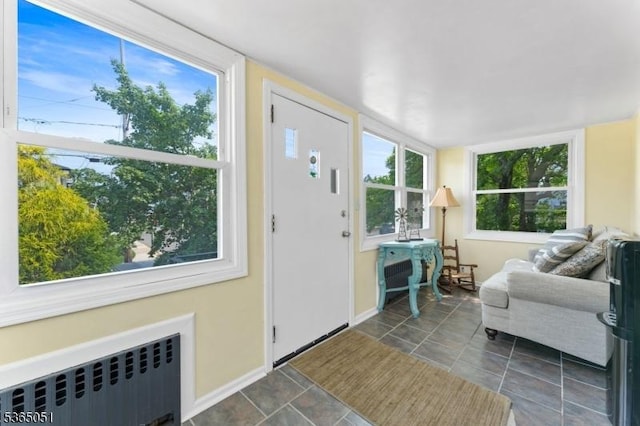 268 Warburton Ave, Hawthorne Boro, NJ 07506 - entryway featuring radiator heating unit and baseboards