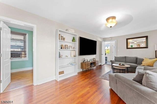 268 Warburton Ave, Hawthorne Boro, NJ 07506 - living room with built in shelves and wood finished floors