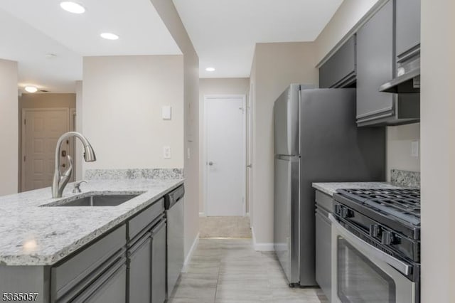44 Sam Bonnell Dr, Union Twp, NJ 08809 - kitchen with stainless steel appliances, gray cabinetry, extractor fan, a peninsula, and light stone countertops