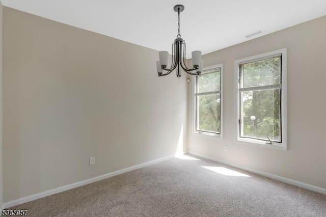 44 Sam Bonnell Dr, Union Twp, NJ 08809 - carpeted empty room featuring a chandelier and healthy amount of natural light