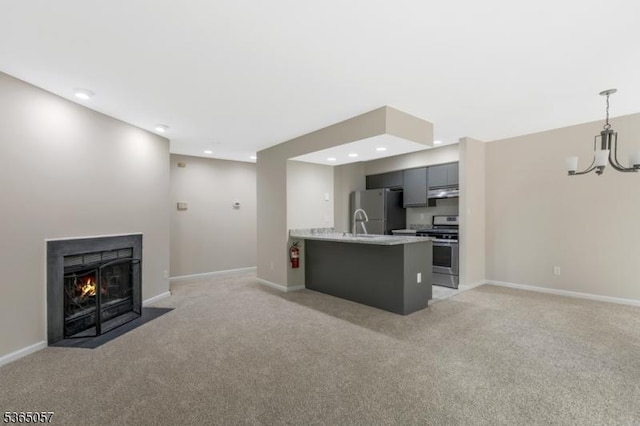 44 Sam Bonnell Dr, Union Twp, NJ 08809 - kitchen featuring stainless steel appliances, a chandelier, light colored carpet, light countertops, and open floor plan