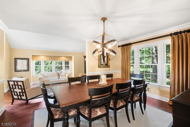 3310 Round Hill Rd, Branchburg Twp, NJ 08876 - dining room with dark wood finished floors, a chandelier, and crown molding