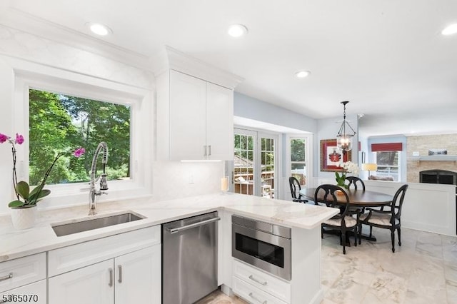 3310 Round Hill Rd, Branchburg Twp, NJ 08876 - kitchen with appliances with stainless steel finishes, white cabinetry, light stone countertops, recessed lighting, and plenty of natural light