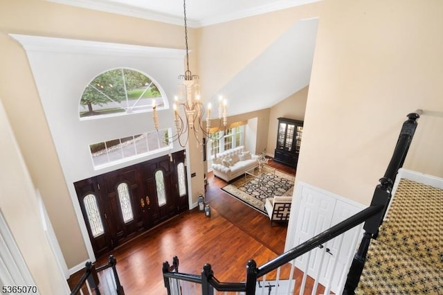 3310 Round Hill Rd, Branchburg Twp, NJ 08876 - entryway with a high ceiling, plenty of natural light, a chandelier, wood finished floors, and crown molding